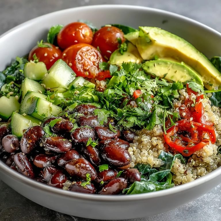 Healthy Three-Bean Power Bowl with quinoa, crisp veggies, and a zesty lemon dressing for easy meal prep.