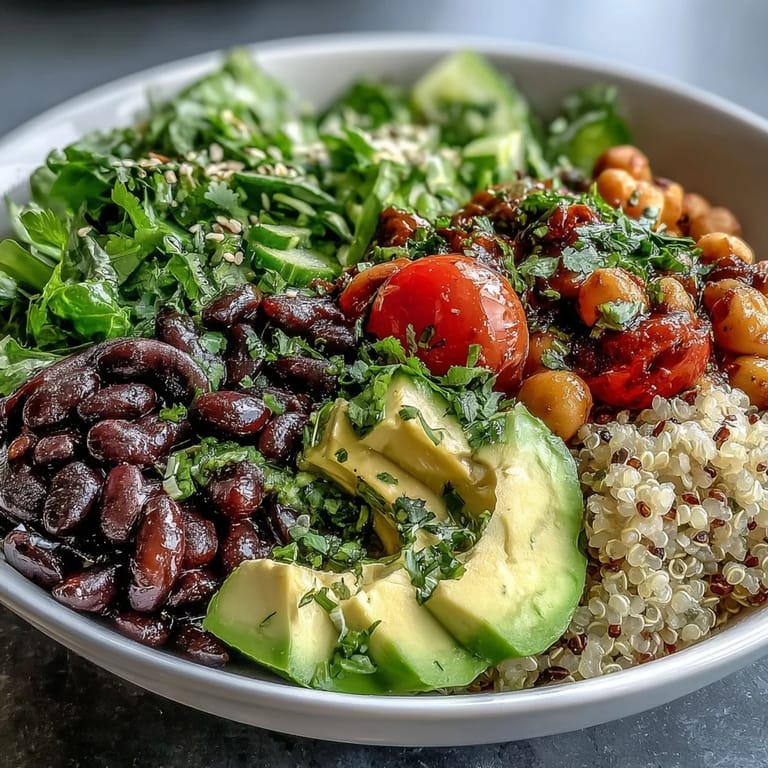 Colorful Three-Bean Power Bowl with black beans, chickpeas, and kidney beans, ready to serve for a protein-packed dinner.